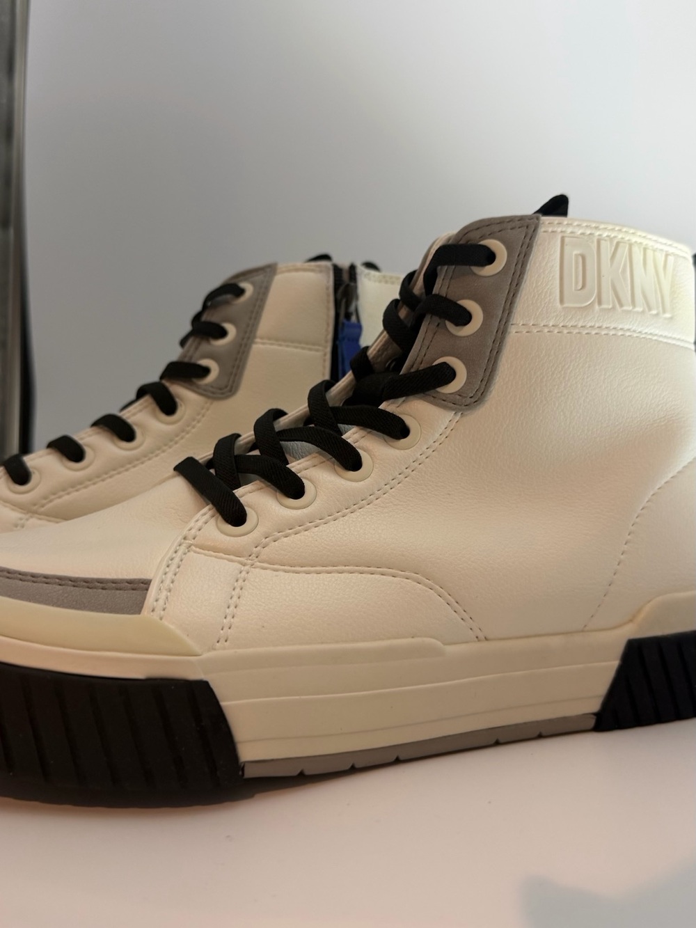 DKNY white and Black High-Top Sneakers